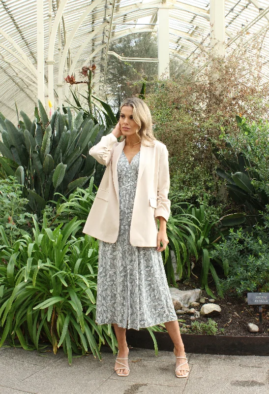 Midi dresses with ruffled bodices for a more pronounced feminine look Leaf Print Button Detail Dress Midi dresses with ruffled bodices for a more pronounced feminine look Leaf Print Button Detail Dress