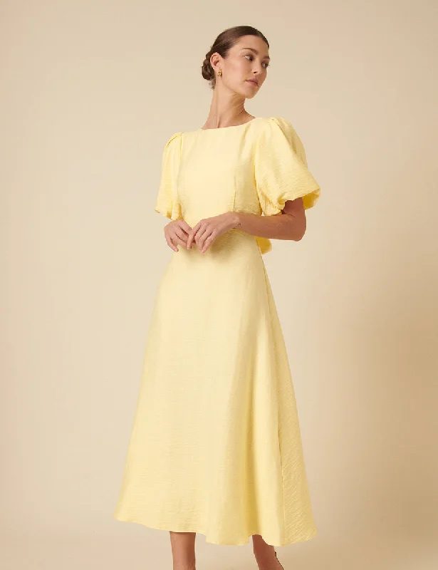 Mini dresses with ruched bodices for a feminine touch Butter Yellow Puff Sleeve Zola Midi Dress Mini dresses with ruched bodices for a feminine touch Butter Yellow Puff Sleeve Zola Midi Dress