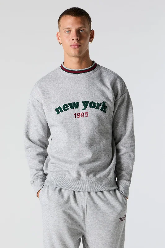 Women's cropped sweatshirt with a slogan graphic for a fun and expressive lookDestination Graphic Fleece Sweatshirt Women's cropped sweatshirt with a slogan graphic for a fun and expressive lookDestination Graphic Fleece Sweatshirt