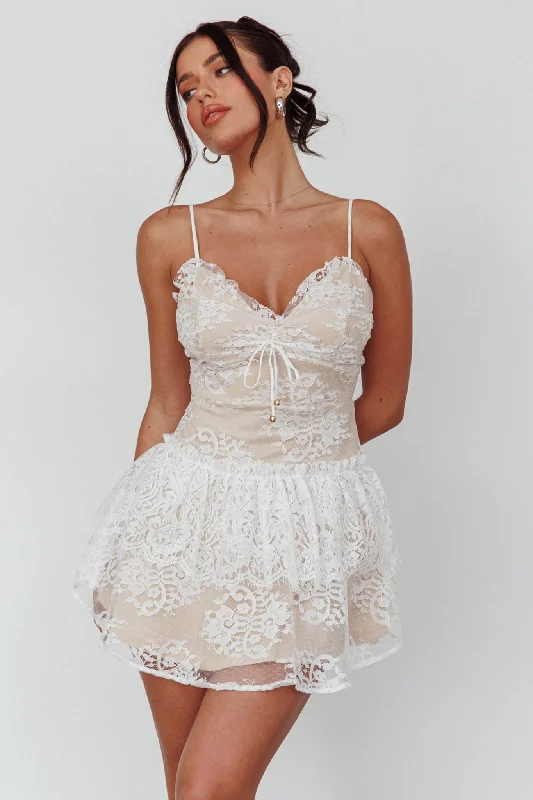 Mini Women Dress with a Short Hem for a Young and Trendy StyleCielo Lace Peplum Mini Dress White