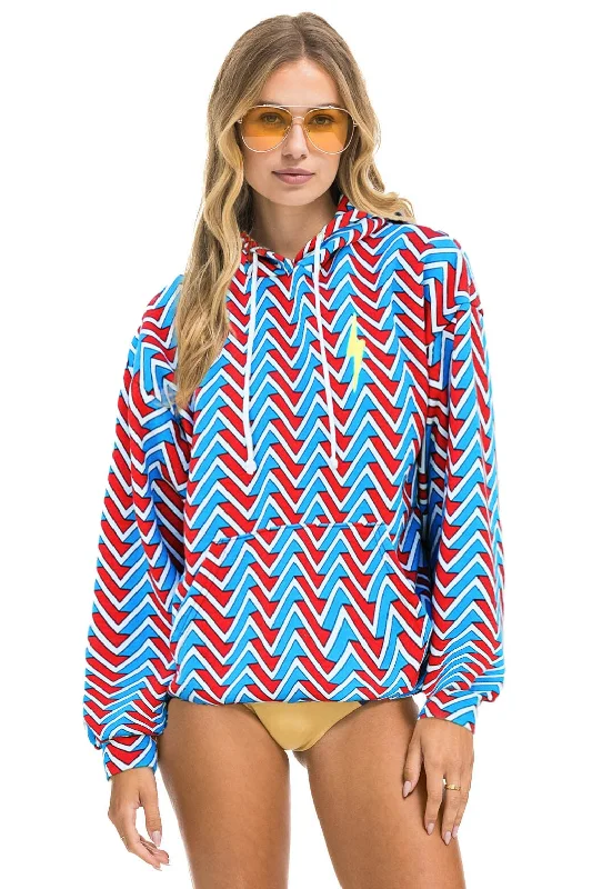 Women's graphic - printed sweatshirt featuring floral patterns for a feminine touchGEO ZIG BOLT EMBROIDERY RELAXED PULLOVER HOODIE - RED // BLUE Women's graphic - printed sweatshirt featuring floral patterns for a feminine touchGEO ZIG BOLT EMBROIDERY RELAXED PULLOVER HOODIE - RED // BLUE