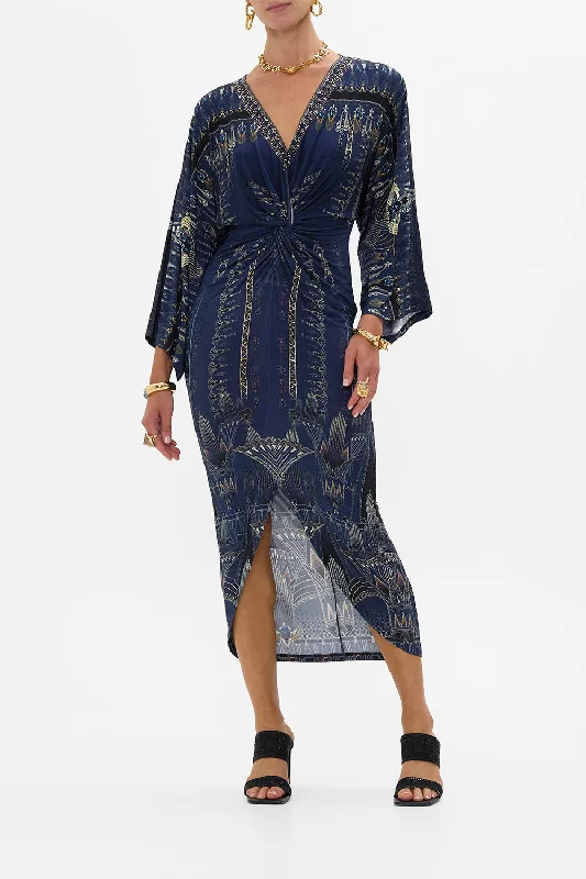 Maxi dresses with a ruched bodice for a more form - fitting and feminine shapeLONG SPLIT FRONT TWIST DRESS THE EGYPT EFFECT Maxi dresses with a ruched bodice for a more form - fitting and feminine shapeLONG SPLIT FRONT TWIST DRESS THE EGYPT EFFECT