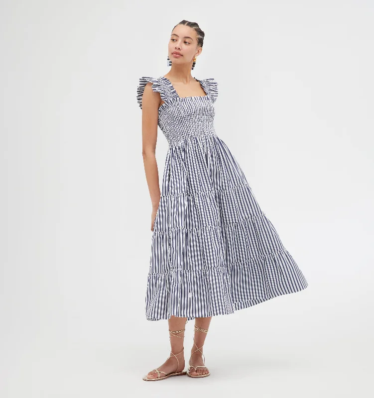 Ruffled maxi dresses with a tiered skirt for added volumeThe Ellie Nap Dress - Navy Stripe Ruffled maxi dresses with a tiered skirt for added volumeThe Ellie Nap Dress - Navy Stripe