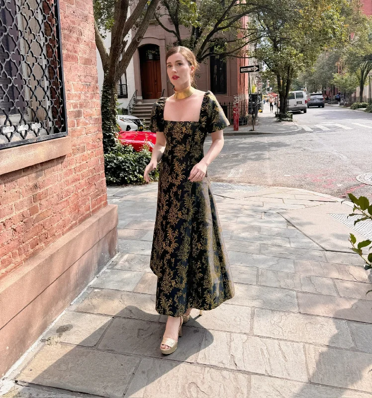 Maxi dresses with a halter neck for a stylish and sophisticated choiceThe Matilda Dress - Moody Bird Brocade Maxi dresses with a halter neck for a stylish and sophisticated choiceThe Matilda Dress - Moody Bird Brocade