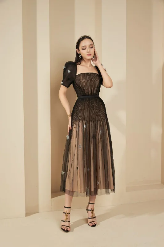 Midi dresses with ruffled sleeves for a more feminine and voluminous lookAniston Pleated Puffy Sleeved Mesh Sheer Dress Midi dresses with ruffled sleeves for a more feminine and voluminous lookAniston Pleated Puffy Sleeved Mesh Sheer Dress