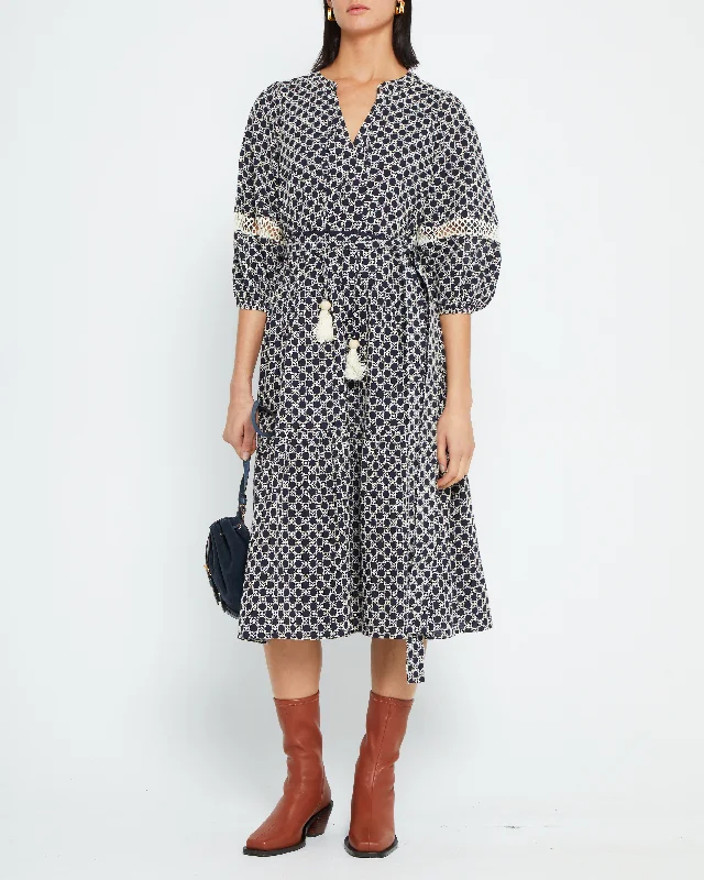 Midi dresses with geometric cutouts for a contemporary and edgy lookHaven Dress