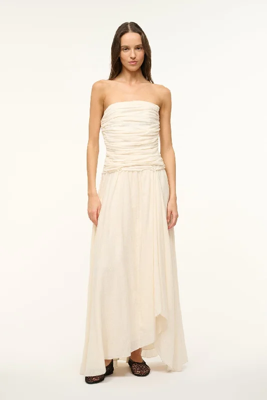 Prom dresses with gathered skirts and crystal - encrusted belts for a luxurious promHIGHTIDE DRESS | BUTTERCREAM Prom dresses with gathered skirts and crystal - encrusted belts for a luxurious promHIGHTIDE DRESS | BUTTERCREAM