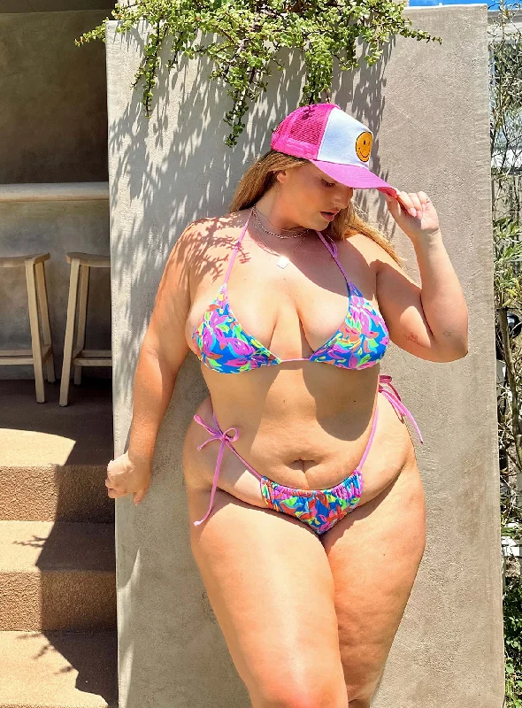 Ruched bikini with fabric gathers for a slimming effectJenner Tie Side Ruched Bikini Bottoms Multi Tropical Curve